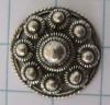 kleding knoop klein plat Zeeuwse knoop